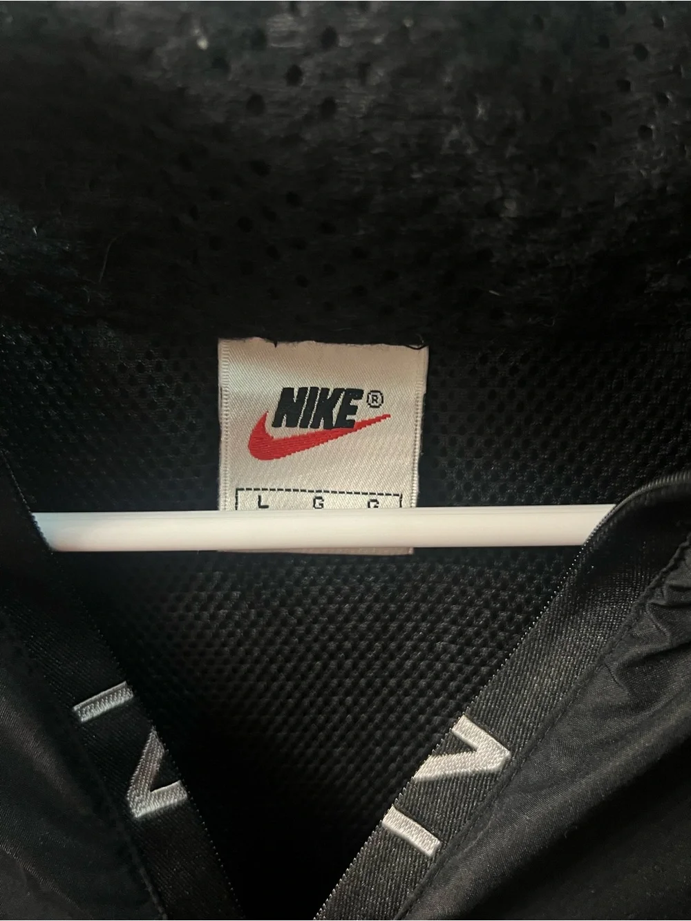 Nike Black Jacket with Red Swoosh Detail
